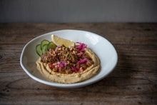 Load image into Gallery viewer, BRAISED BEEF ON HUMMUS
